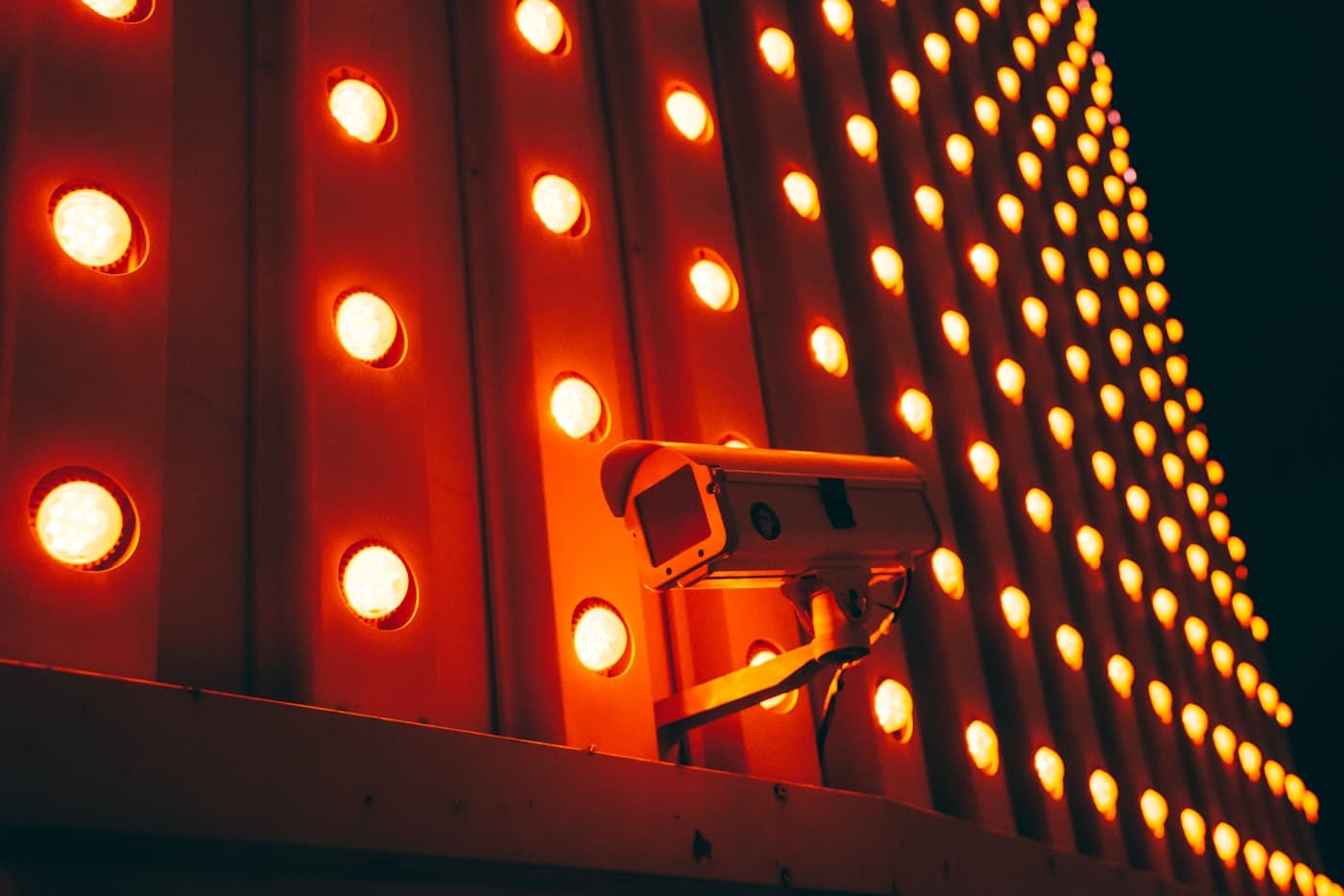 Security camera installed outside a building at night