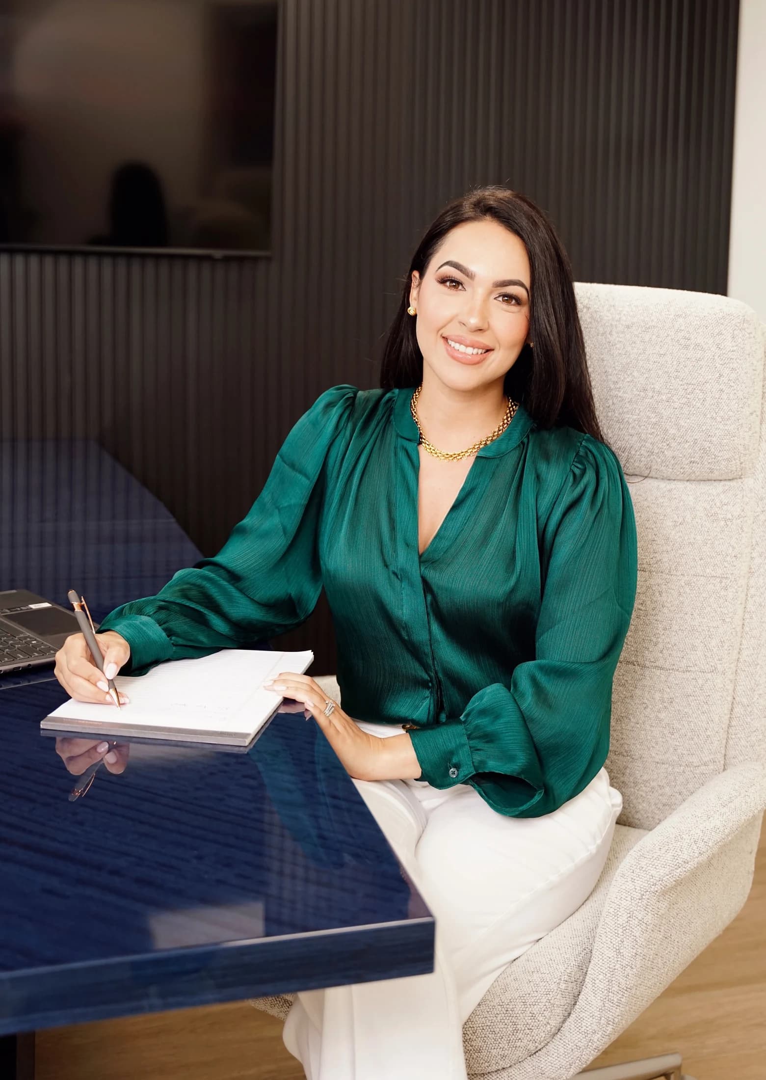 Kielan Saborit seated in the Saborit Law office